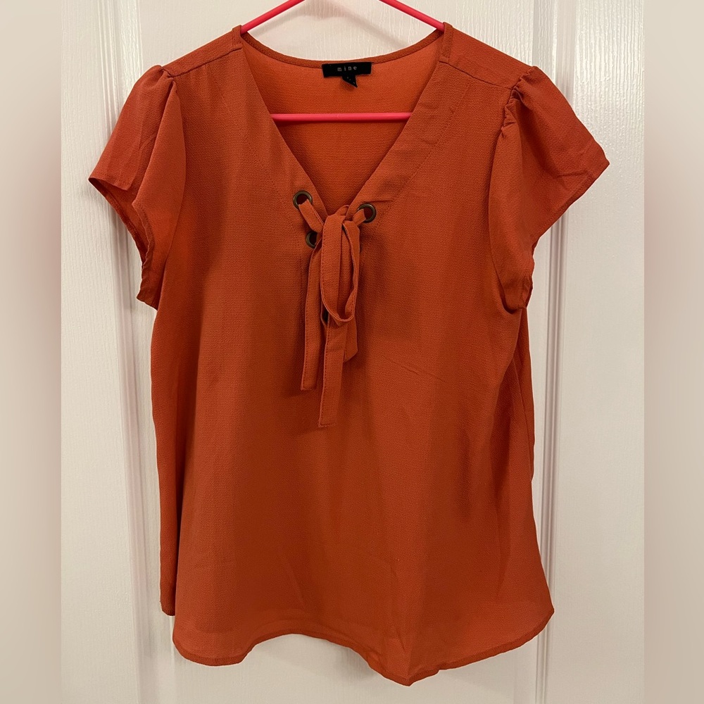 mine • size L • orange short sleeve blouse with lace up tie
